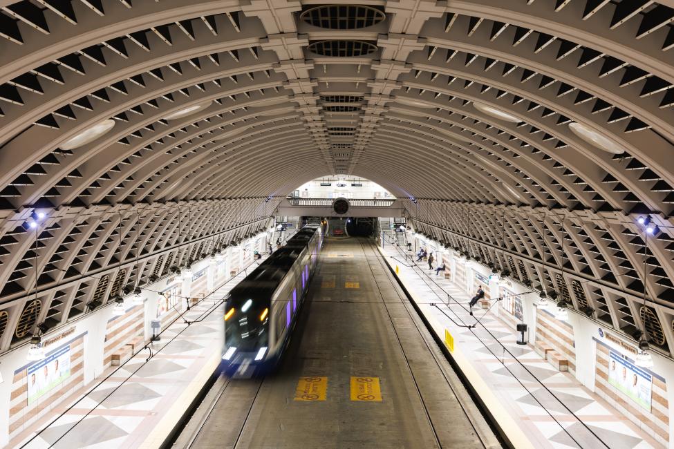 A Link train pulls into the platform at Pioneer Square Station