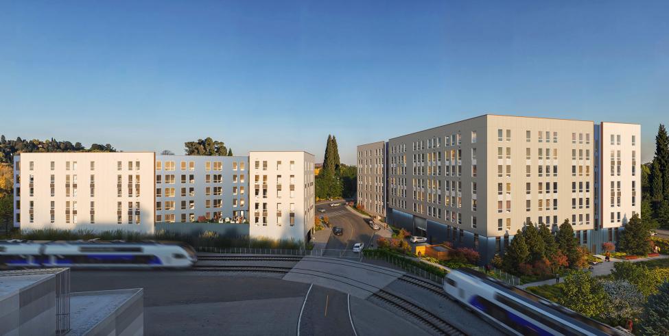 A rendering of a multiple story white housing complex next to a light rail station.