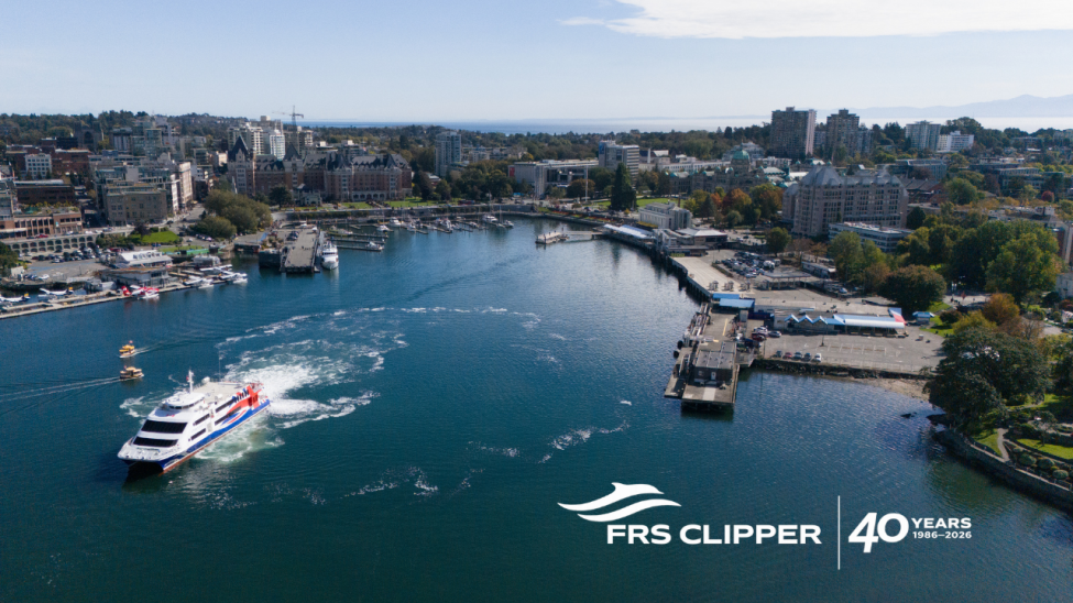 An aerial photograph of the Victoria Clipper leaving a dock