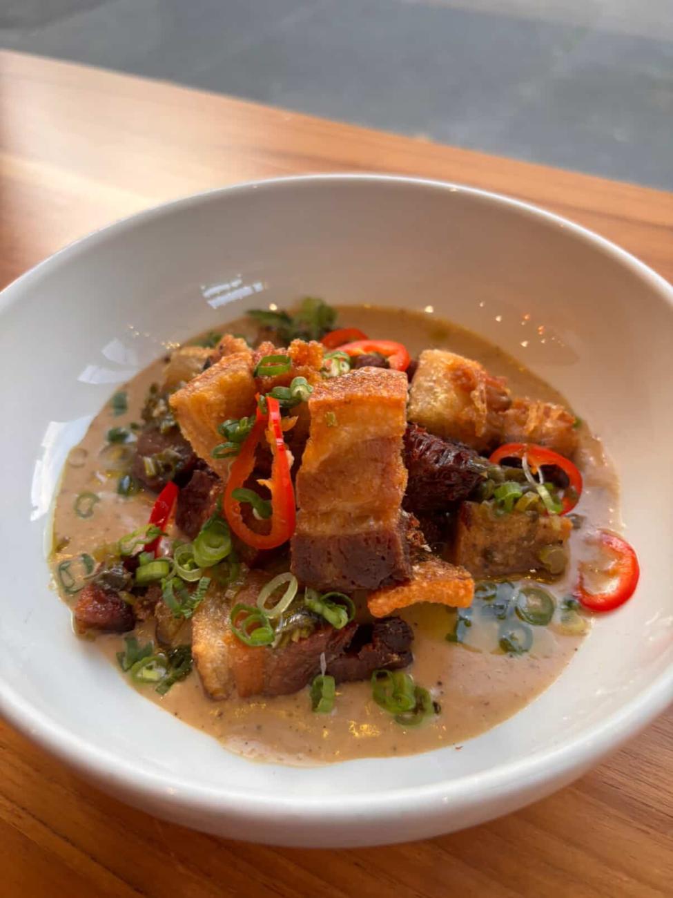A plate of crispy pork belly