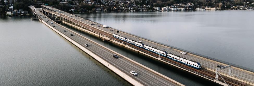 A four-car Link train travels across the I-90 floating bridge