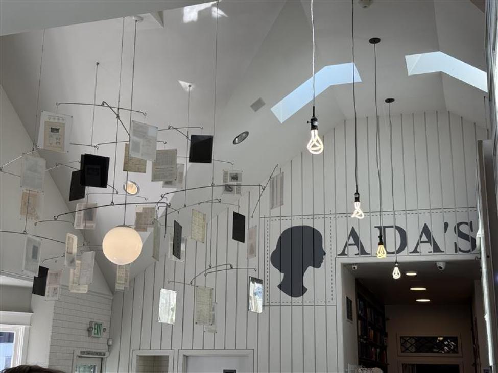 Chandeliers at Ada's feature orb lights and pages from books