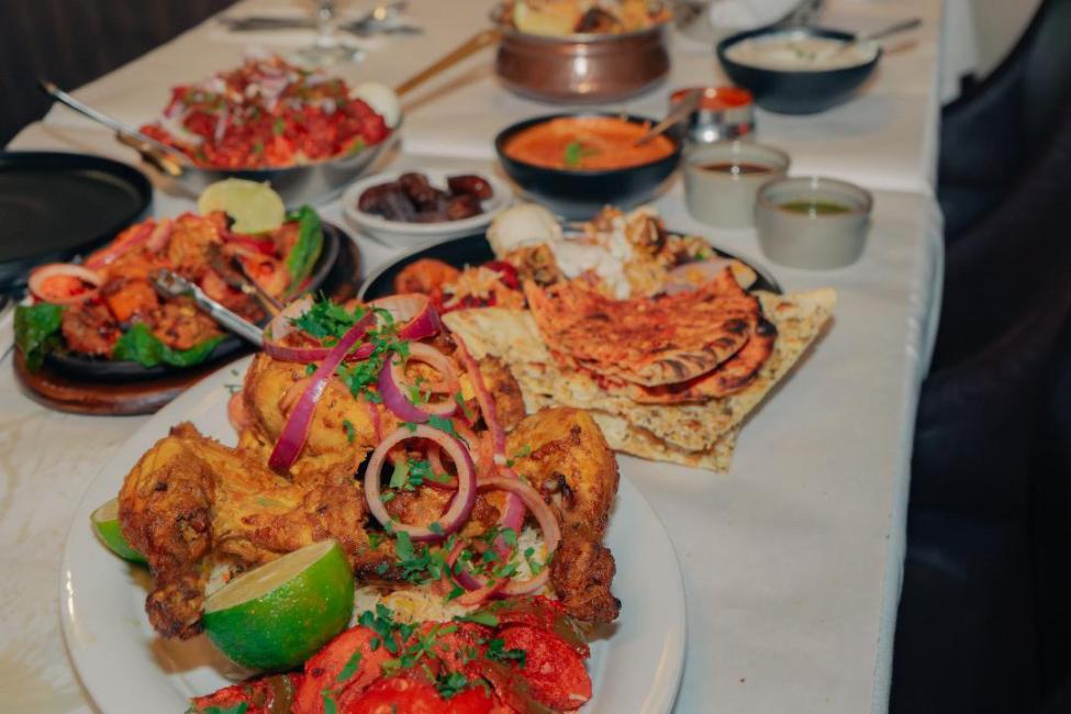 Six Indian dishes on a table