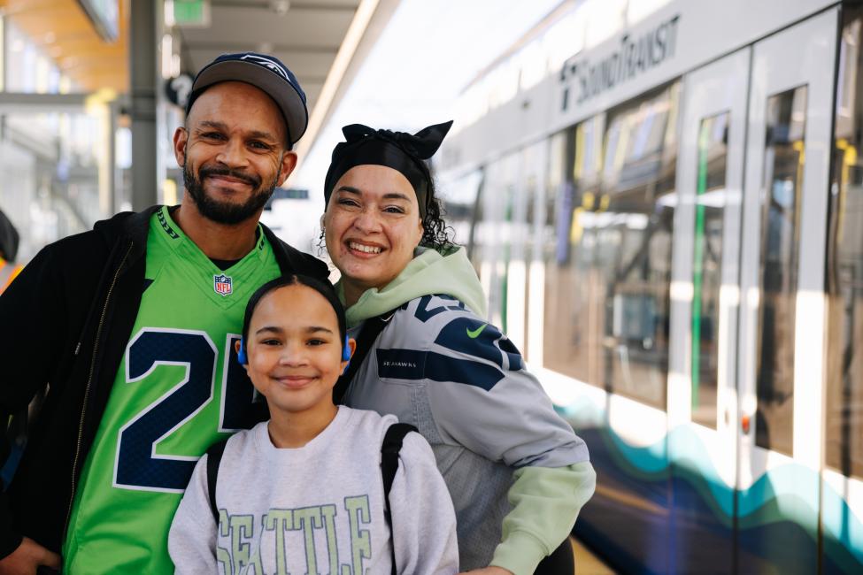 Seahawks fans outside link train