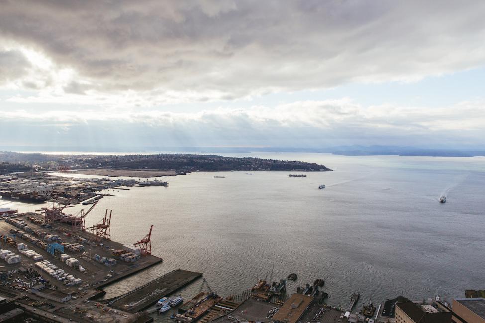 A view of Elliott Bay and West Seattle from a tall building in downtown Seattle