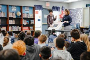 A science experiment about electromagnets and light rail fascinates local students.