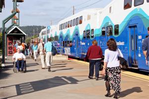 Passengers deboard a Sounder train at the Sumner Station.