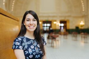 Sound Transit intern Asela Chavez-Basurto smiles in the Great Hall at Union Station.