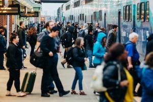 Passengers board a Sounder train.