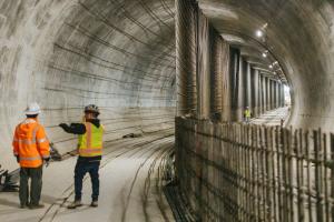 Workers inside the tunnel underneath downtown Bellevue discuss how awesome it will be for the Sounders to win the MLS Cup in front of the hometown crowd. 