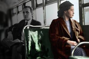 Civil rights pioneer Rosa Parks takes her seat at the front of the bus. 