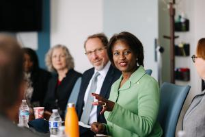 FTA Administrator Nuria Fernandez gestures while speaking to the Sound Transit executive leadership team. 