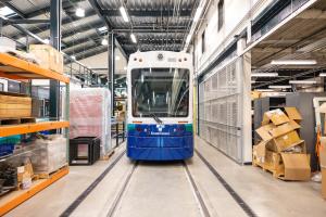 A Tacoma Link vehicle is parked in the Operations and Maintenance Facility. 