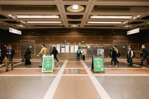 Passengers walk along the mezzanine at Pioneer Square Station