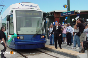 A crowd celebrates the opening of the T Line in 2003