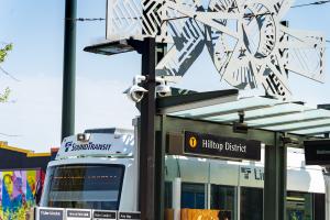 A metal art piece on top of the new Hilltop station