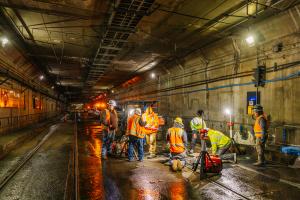 A group of workers in the downtown Seattle transit tunnel