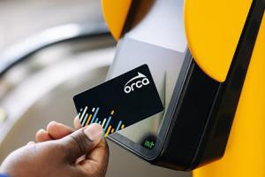 ORCA card next to a ticket reading machine
