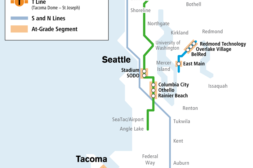 Map with at-grade crossings through ST district. Highlights at-grade crossings in the Rainier Valley in Seattle, through Bellevue and Redmond, and in Tacoma.