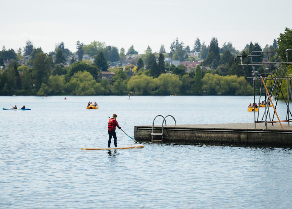 SUP by a dock at Green Lake