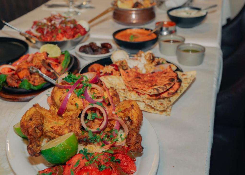 Six Indian dishes on a table