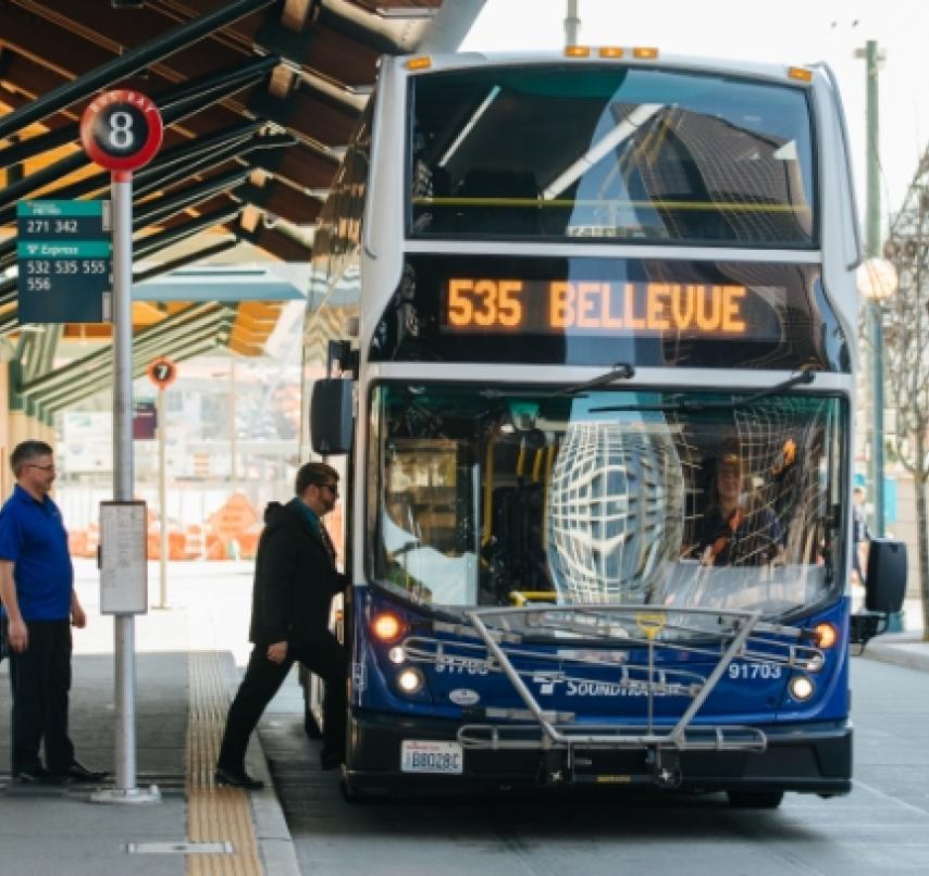 Passengers board a Sound Transit bus.