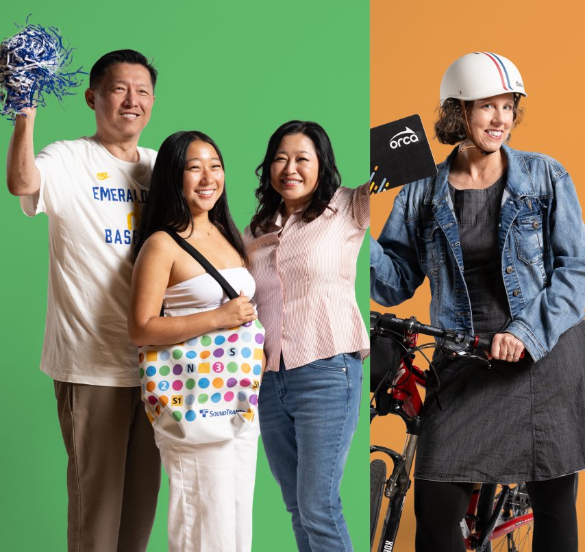 A group of three people wear Sound Transit gear, another person is wearing a helmet and holding a bike.
