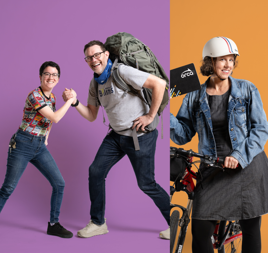Two people shake hands playfully and another person wearing a helmet and holding a bike shows off their Orca card.